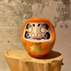Daruma Takasaki Naranja