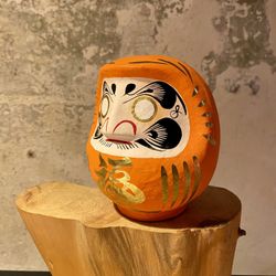 Daruma Takasaki Naranja