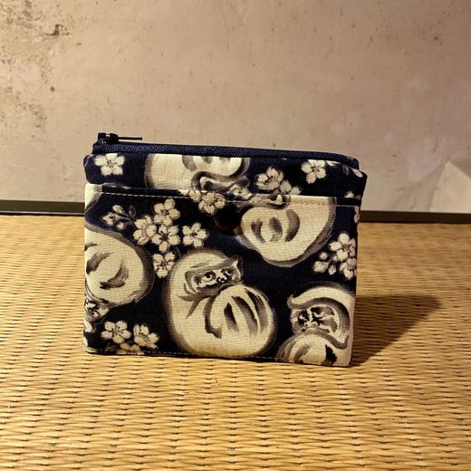 Monedero Daruma