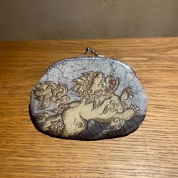 Monedero Shishi